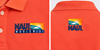 Picture of Naui Logo Embroidered Performance Polo - Coral